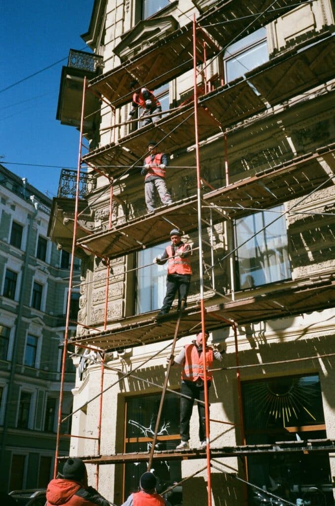 a group of men on scaffolding
