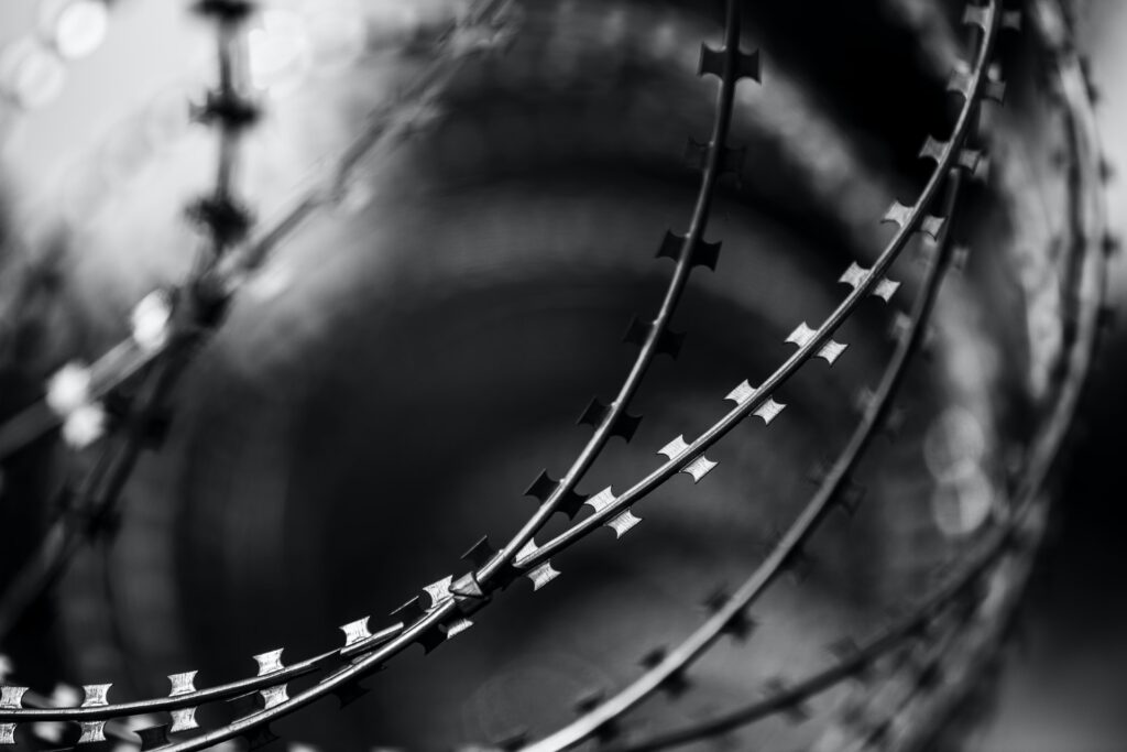 close up of a barbed wire fence
