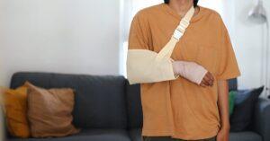 man wearing sling