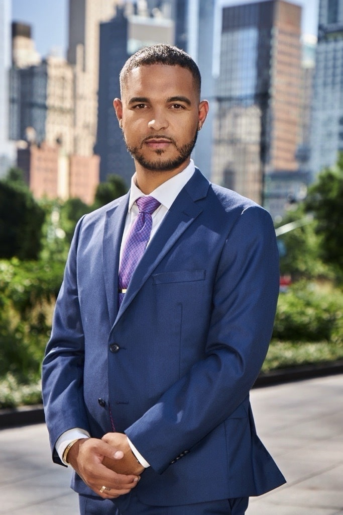 Omar T. Russo, Esq. Associate Attorney in Civil Rights picture outside of Shulman & Hill Manhattan Office