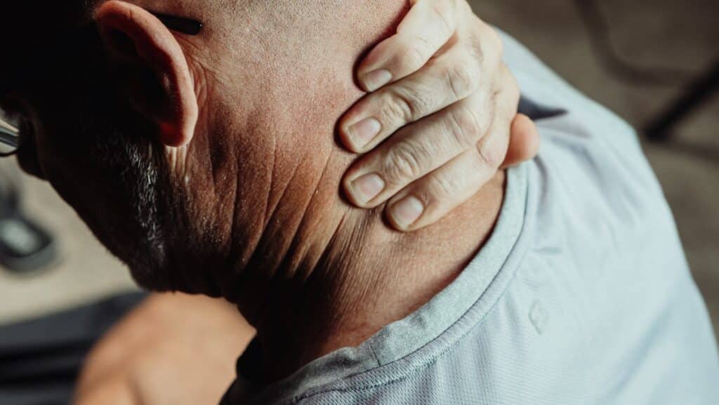 a man having a neck pain