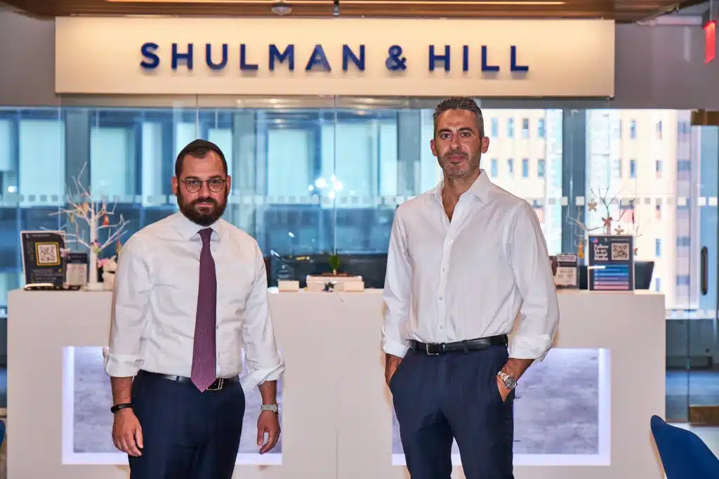 Shulman and Hill in their office ready to win your case.