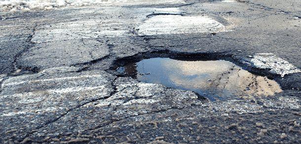 Who Pays After a Fall in a Parking Lot Pothole?